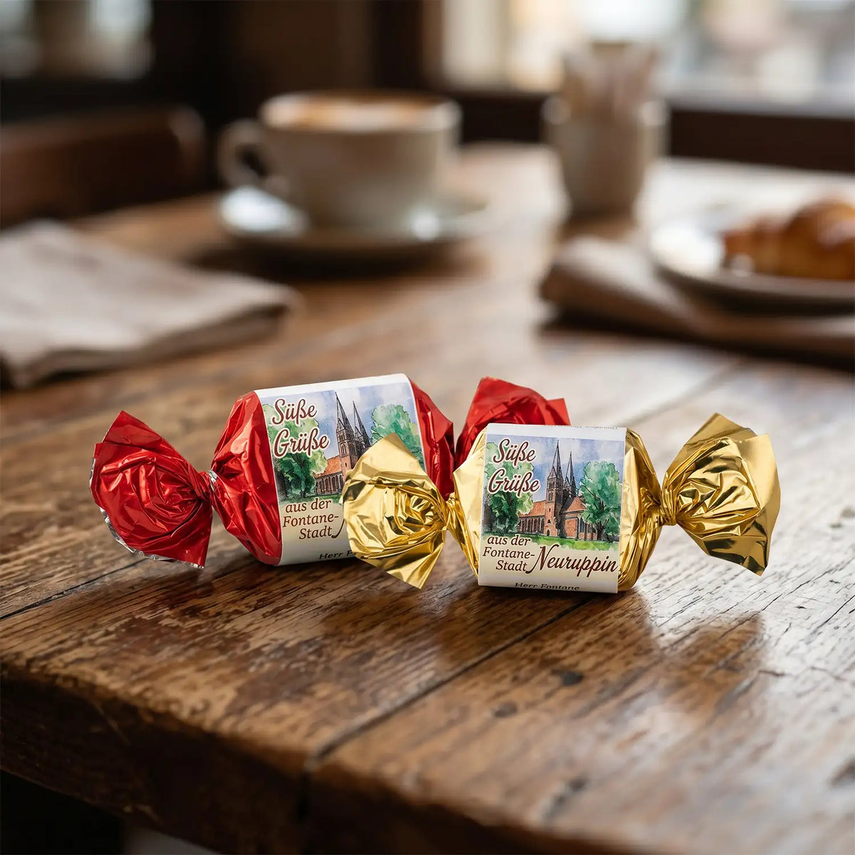 neuruppin-Happen-25g-marzipan-nougat-aufhoelzernemKaffeetisch