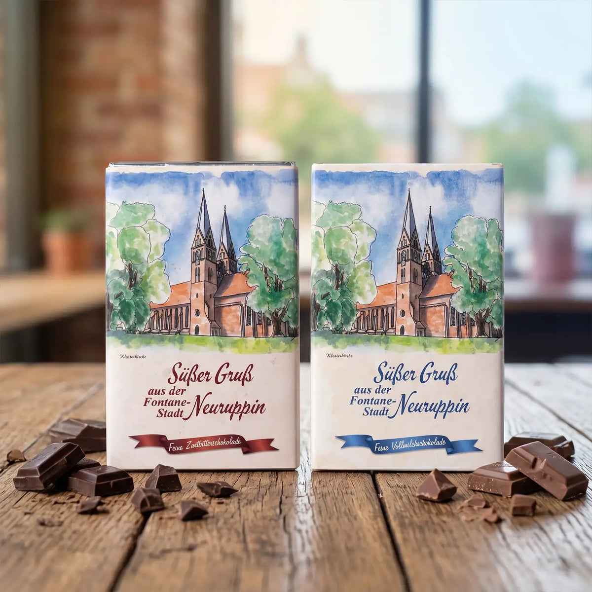 neuruppin-suesser-gruss-vollmilch-zartbitter-125g-vorderseite-beide-mit-pastell-Hintergrund