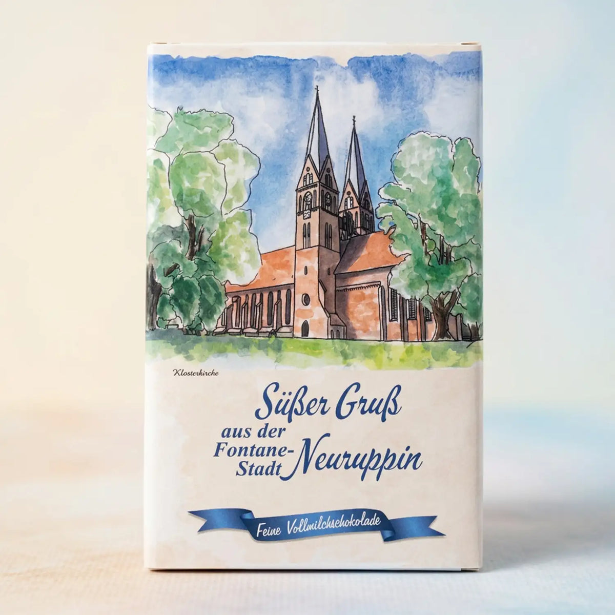 neuruppin-suesser-gruss-vollmilchtafel-125g-vorderseite-mit-pastell-Hintergrund